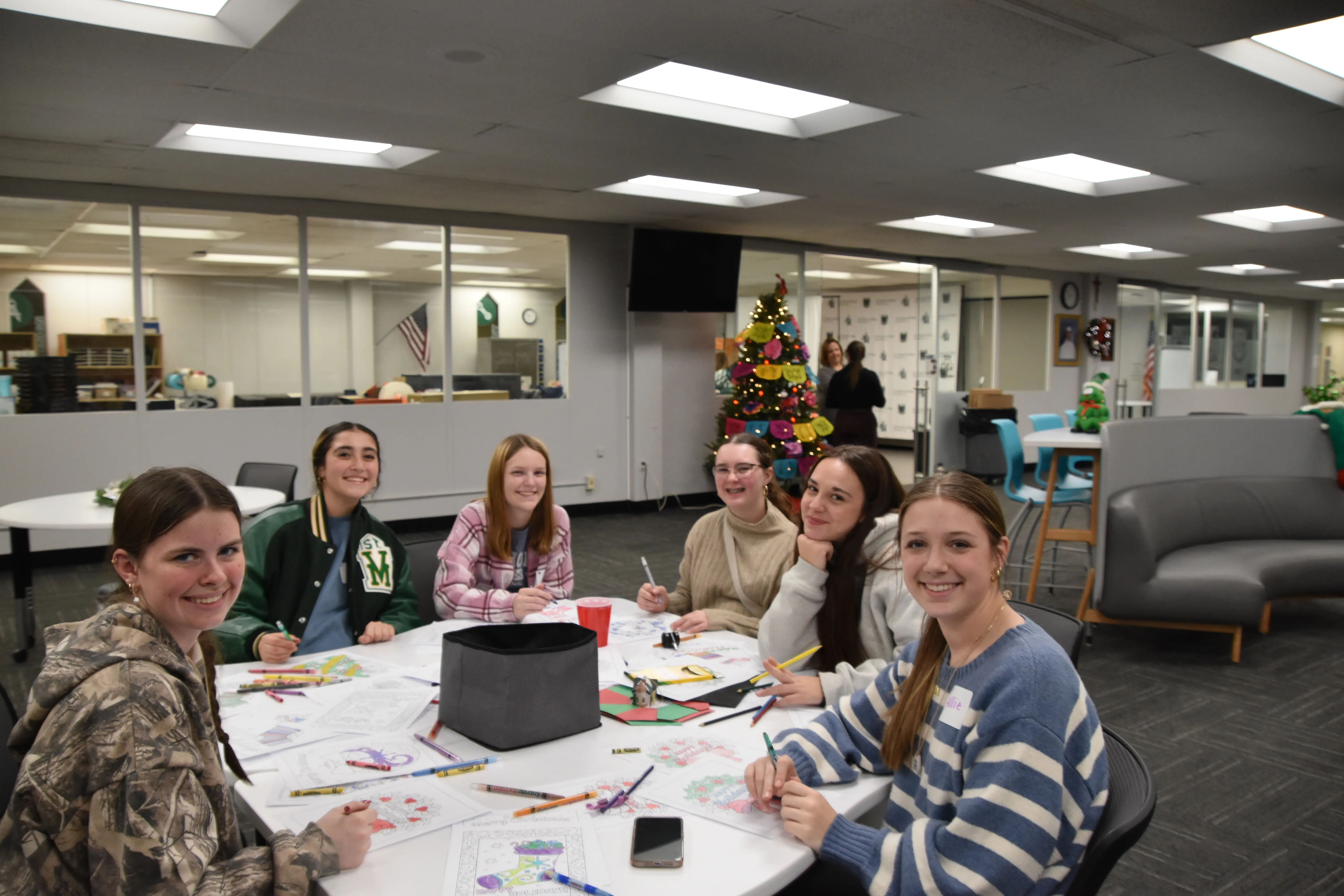 St. Vincent-St. Mary High School students collaborating at a circle table