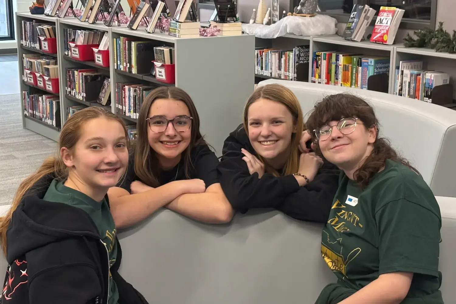 STVM students sitting together in the library.