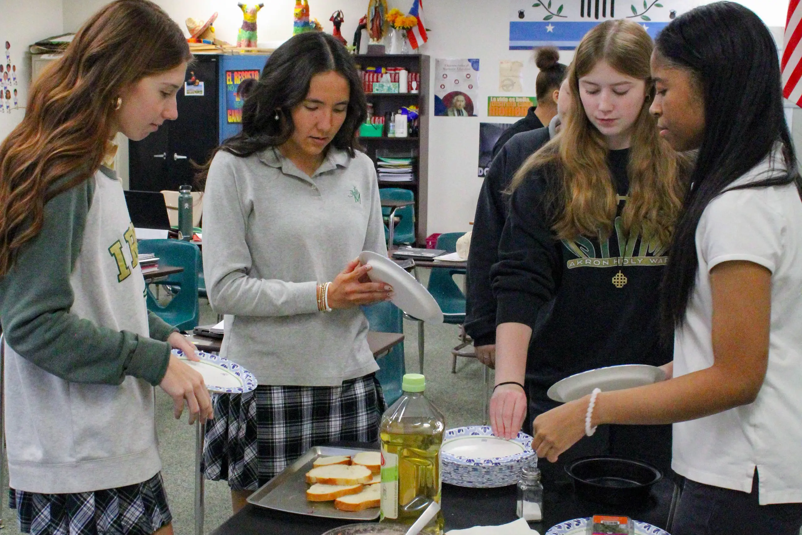 St. Vincent-St. Mary High School students dissecting a fish in a science class.