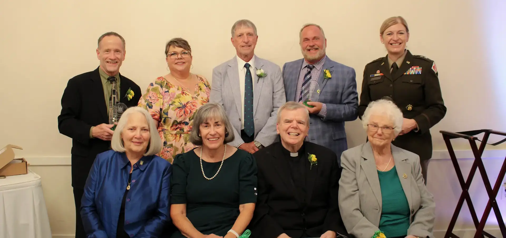 St Vincent St Mary High School Mahar & Alumni Awards recipients smiling for a photograph at the awards event.