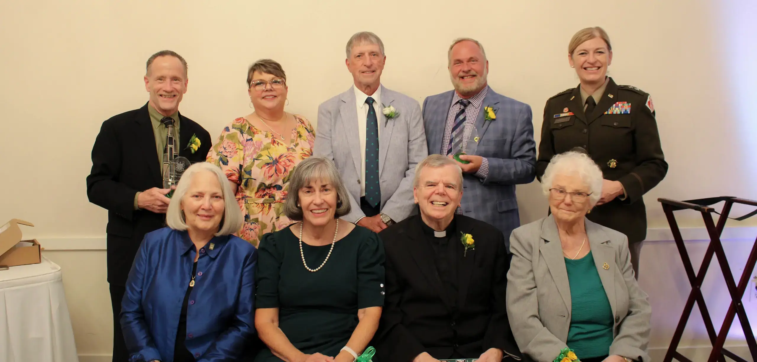 St Vincent St Mary High School Mahar & Alumni Awards recipients smiling for a photograph at the awards event.