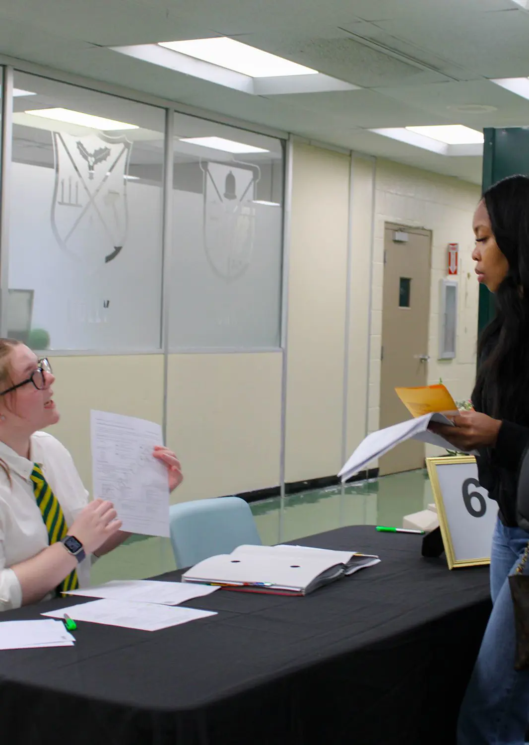 St Vincent St Mary High School students handing in paperwork.