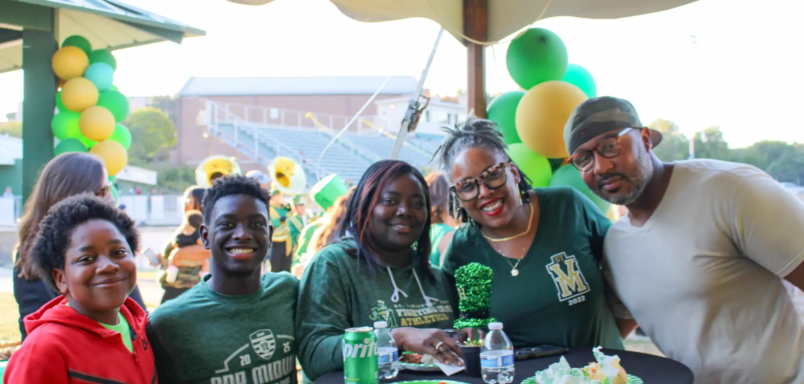 St. Vincent-St. Vincent St. Mary High School students with their family at a school event.