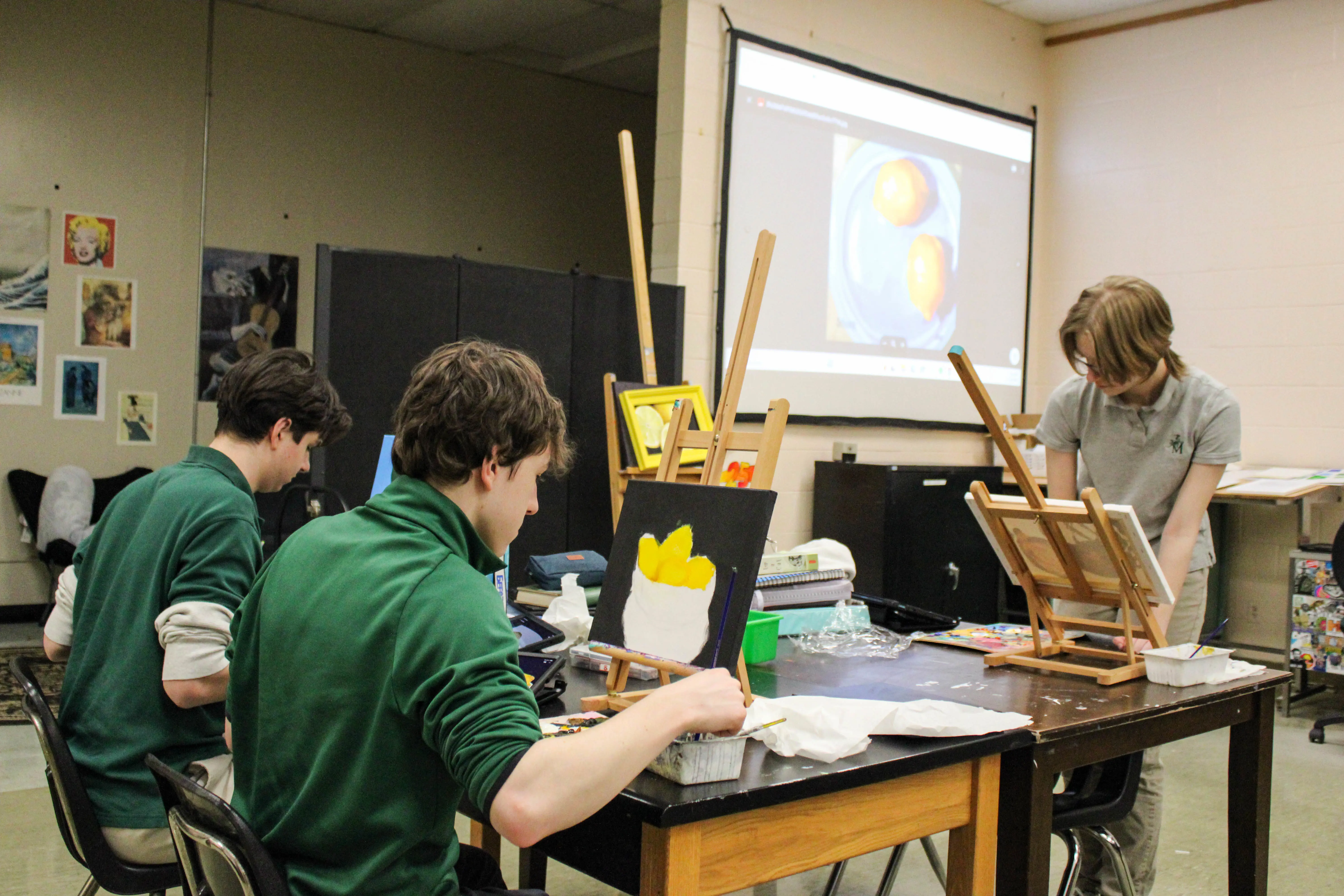 STVM students dissecting a fish in a science class.