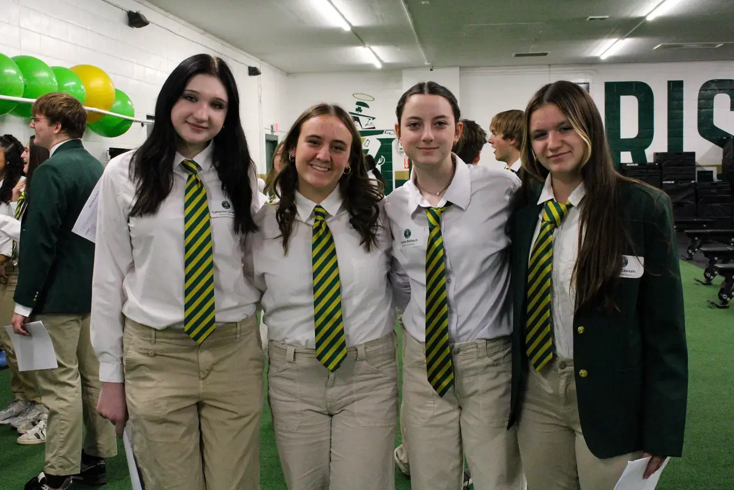 St Vincent St Mary High School students in uniform at a school event.