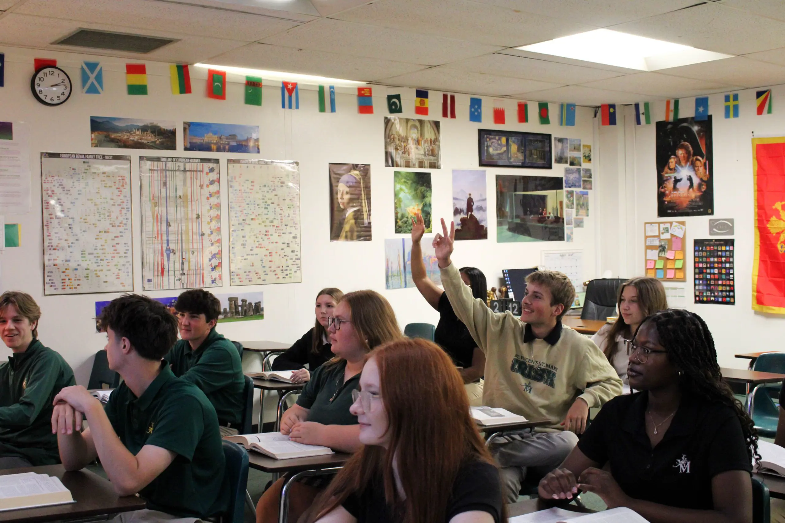 St. Vincent-St. Mary High School students listening contemplatively in a science class.
