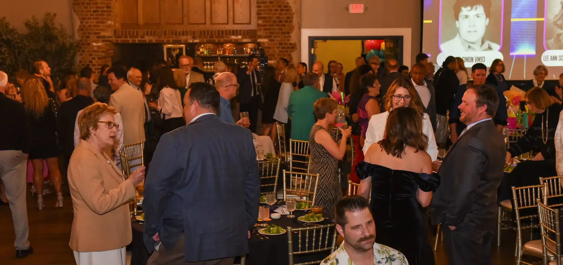 Guests socialising at a STVM Showcase event.