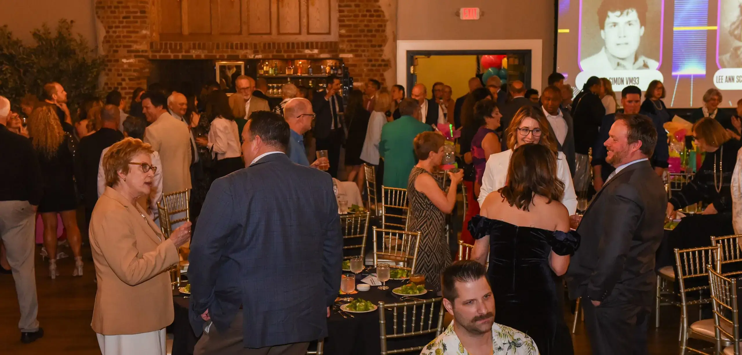 Guests socialising at a STVM Showcase event.