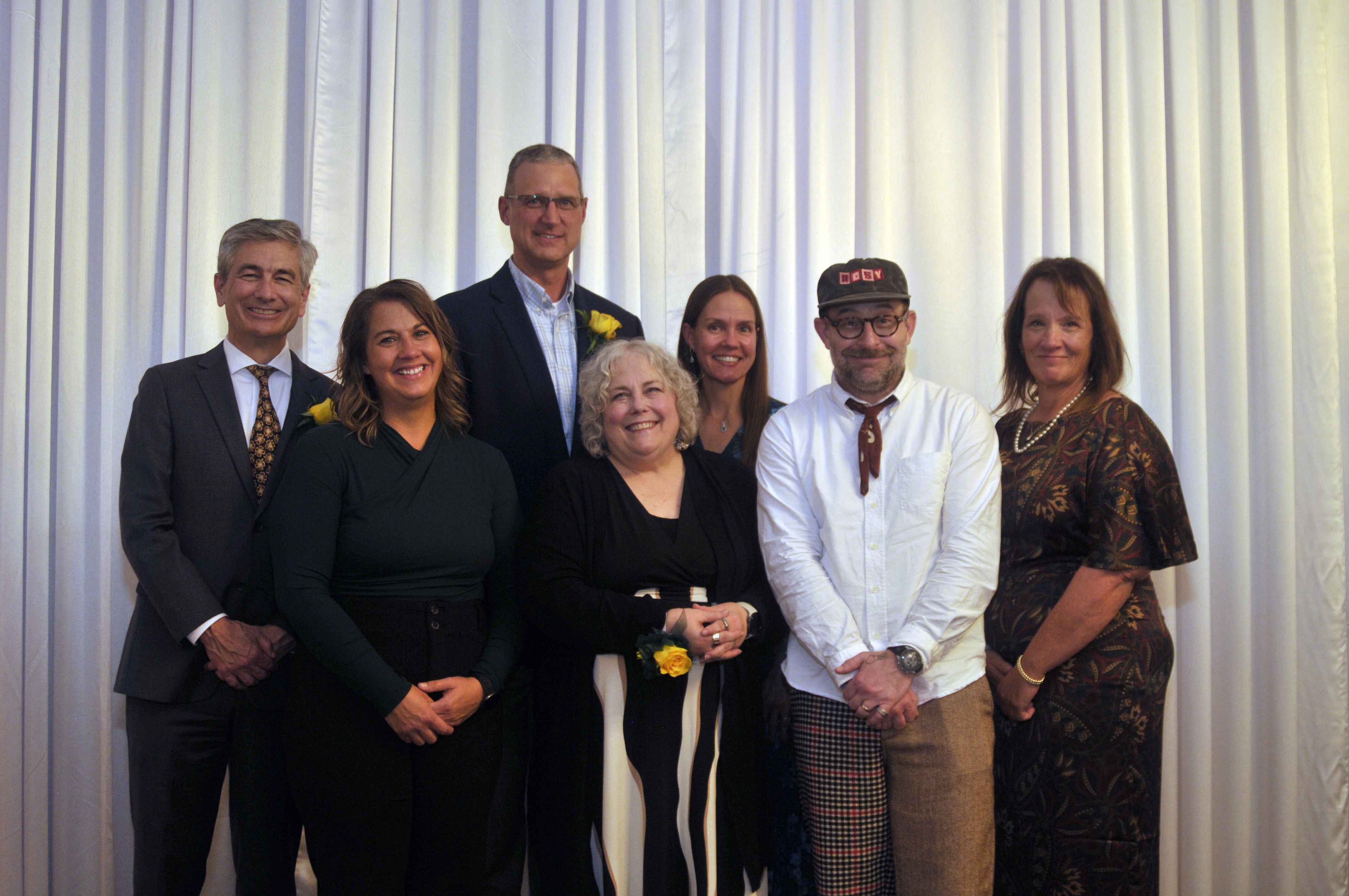St Vincent St Mary High School Mahar & Alumni Awards recipients smiling for a photograph at the awards event. 