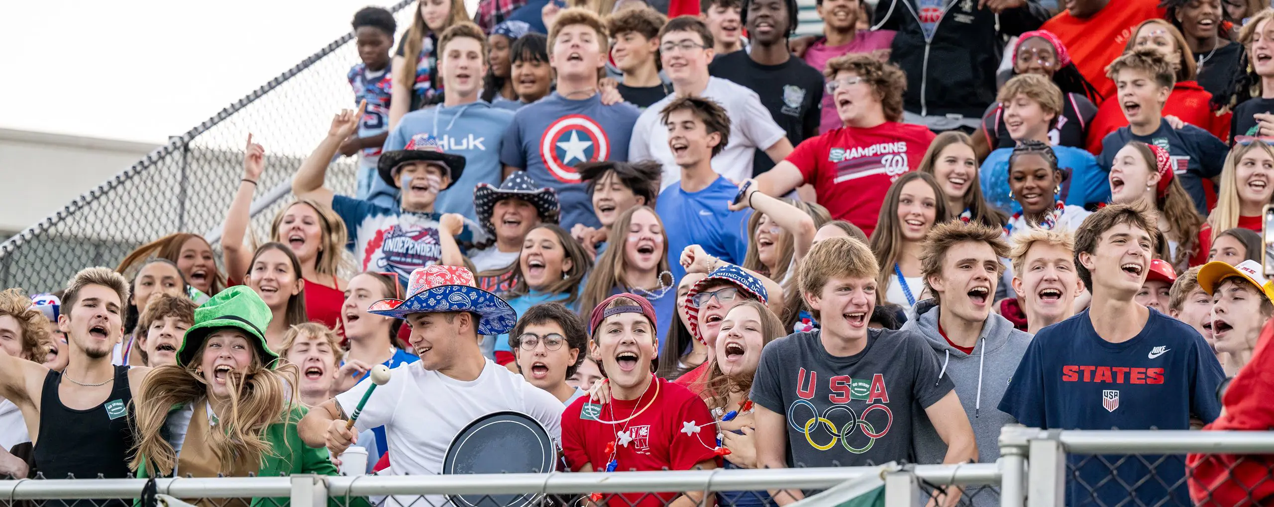 STVM students cheering in the stands at a football game.