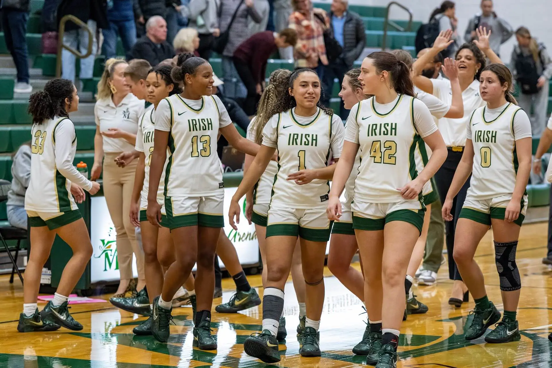 STVM Girls' Basketball team playing in a game.